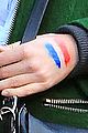 emma stone draws french flag on her hand to support paris 04
