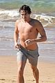 tyler blackburn shirtless body on the beach 05
