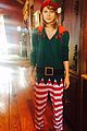 taylor swift dresses as an elf in cute christmas photo 02
