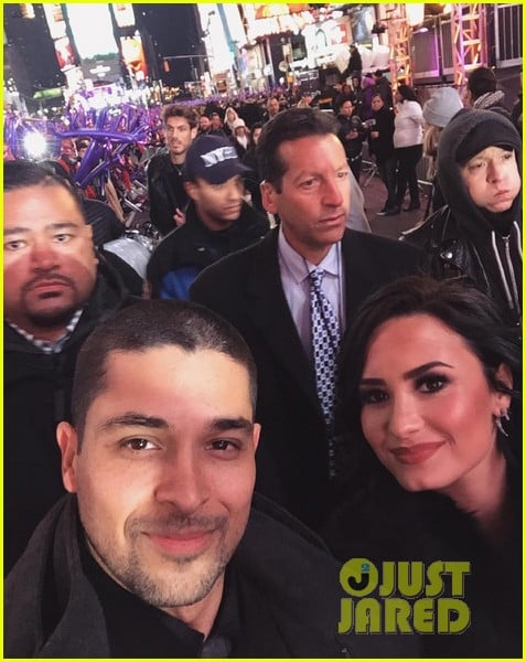 wilmer valderrama supports demi lovato on new years eve 04