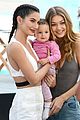 lilyy and gigi kiss babies for sports illustrated 02