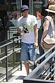 louis tomlinson goes barefoot at starbucks danielle campbell celebrated dcoms 15