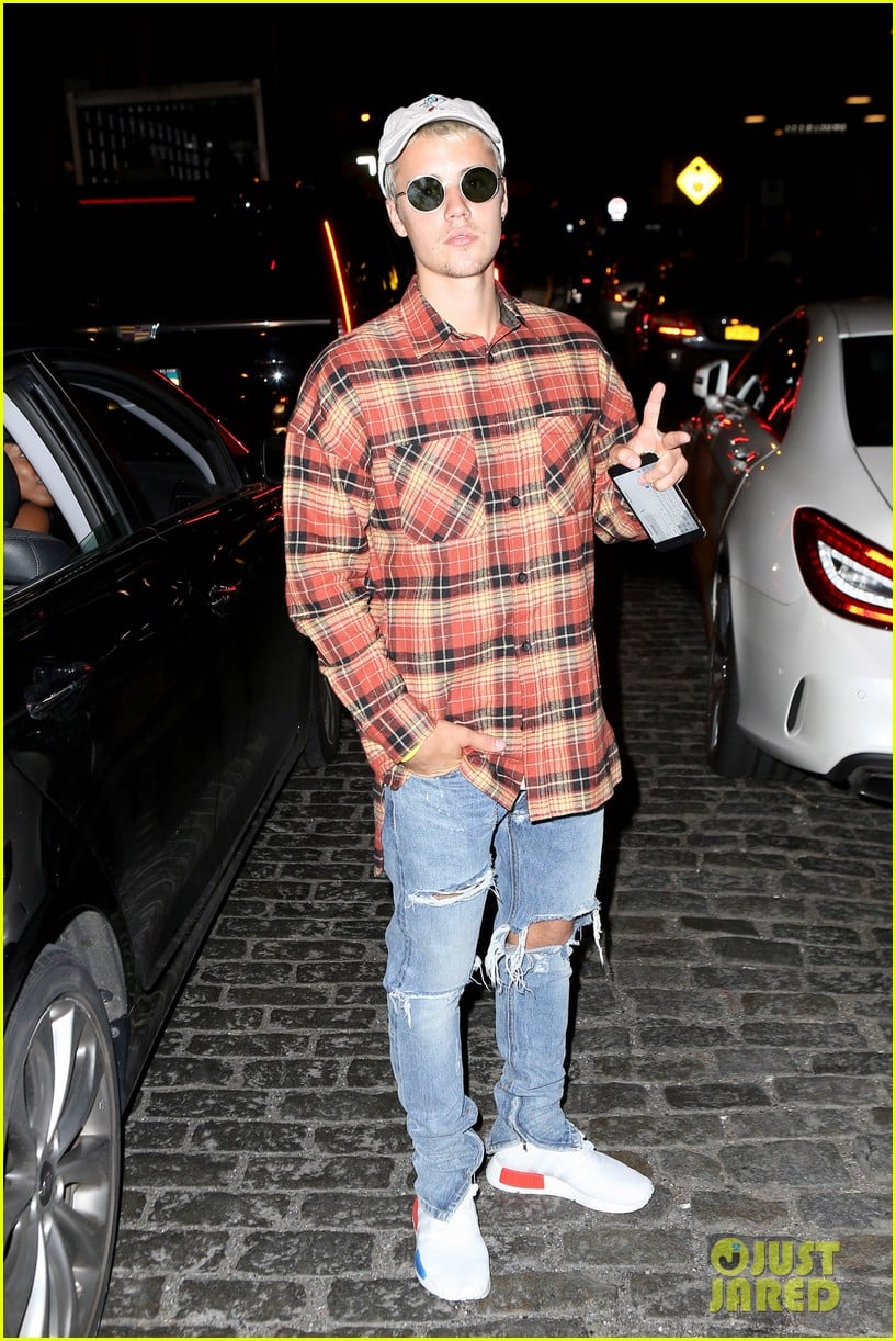 Justin Bieber arriving at Louis Vuitton in Paris, France today.