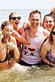 taylor swift embraces shirtless tom hiddleston on water slide 01
