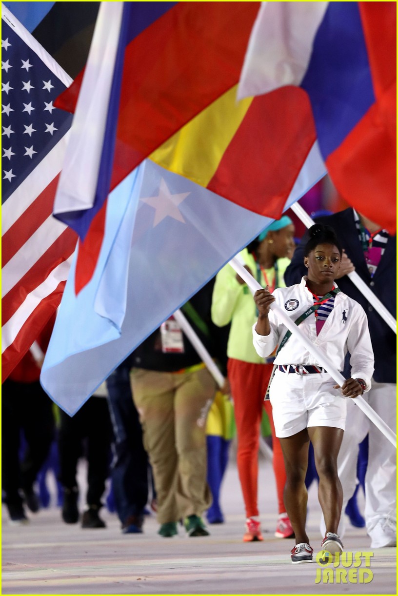 Full Sized Photo of simone biles carries flag at olympics closing ...