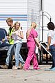emma roberts pink scrubs queens coffee pickup 01