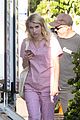 emma roberts pink scrubs queens coffee pickup 02