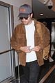 rob pattinson hurries to catch a flight out of lax airport 01
