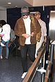 rob pattinson hurries to catch a flight out of lax airport 07