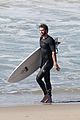 liam hemsworth goes for monday morning surf session with brother luke 01