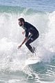 liam hemsworth goes for monday morning surf session with brother luke 03