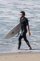liam hemsworth goes for monday morning surf session with brother luke 06