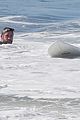 liam hemsworth goes for monday morning surf session with brother luke 20