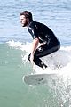 liam hemsworth goes for monday morning surf session with brother luke 26