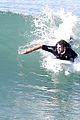 liam hemsworth goes for monday morning surf session with brother luke 28