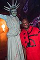 bella thorne tyler posey couple up at halloween horror nights 04