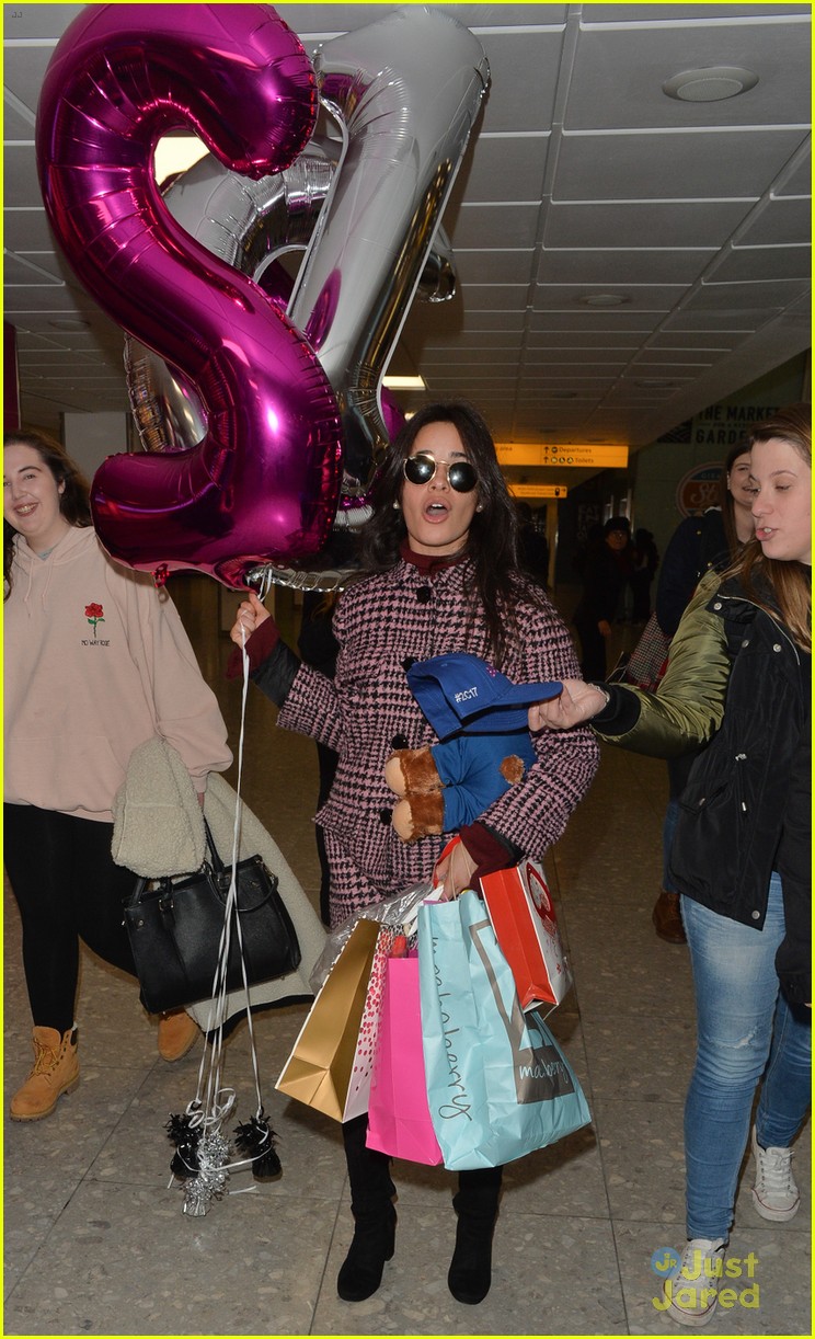 Full Sized Photo of camila cabello bear balloons heathrow airport 05