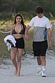ansel elgort goes shirtless for a workout at the beach 11