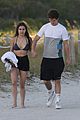 ansel elgort goes shirtless for a workout at the beach 12