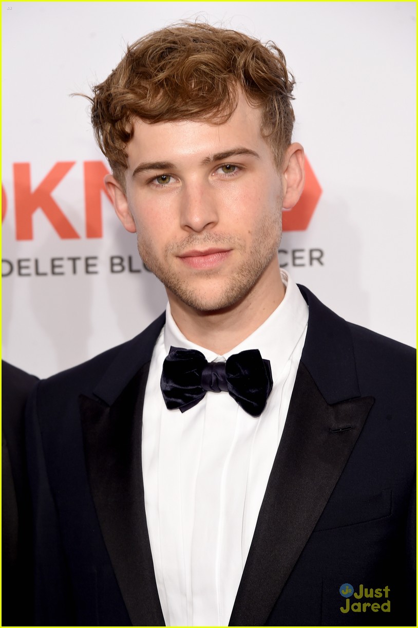 Tommy Dorfman Suits Up For DKMS Gala with Alexandra Daddario | Photo