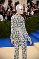 cara covers her bald head with crystals at met04