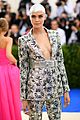 cara covers her bald head with crystals at met10