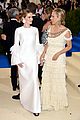 zoey deutch margaret qualley and olivia cooke pose with their met gala 2017 designers 04