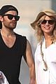 paul wesley candice king hit the beach in rio 02
