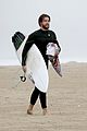 liam hemsworth strips out of wetsuit to reveal ripped abs 10