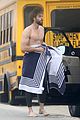 liam hemsworth strips out of wetsuit to reveal ripped abs 12