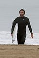 liam hemsworth strips out of wetsuit to reveal ripped abs 18