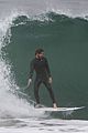 liam hemsworth strips out of wetsuit to reveal ripped abs 21