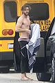 liam hemsworth strips out of wetsuit to reveal ripped abs 24