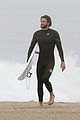 liam hemsworth strips out of wetsuit to reveal ripped abs 27