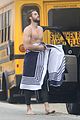 liam hemsworth strips out of wetsuit to reveal ripped abs 28