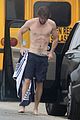 liam hemsworth strips out of wetsuit to reveal ripped abs 54