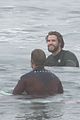 liam hemsworth strips out of wetsuit to reveal ripped abs 64