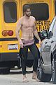 liam hemsworth strips out of wetsuit to reveal ripped abs 75