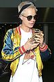 cara delevingne returns home from her trip to paris 04