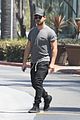 taylor lautner shows off buff body in tight shirt 03