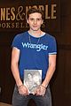 brooklyn beckham signs copies of his book what  see my mom cried 05