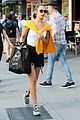 bella hadid rocks white bodysuit and yellow hoodie in nyc 05