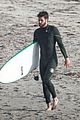liam hemsworth spends the afternoon surfing in malibu 02