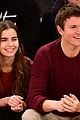 ansel elgort attends basketball game with girlfriend violetta komyshan and timothee chalamet 04