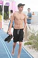 presley gerber flaunts his abs while going shirtless at the beach 03