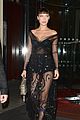 bella hadid channels the matrix while stepping out in paris 02