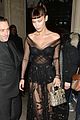 bella hadid channels the matrix while stepping out in paris 10