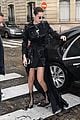 bella hadid channels the matrix while stepping out in paris 11
