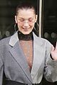 bella hadid goes bralass in a sheer top and two tone suit jacket 03