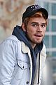 kj apa arrives in vancouver with mystery blonde 06